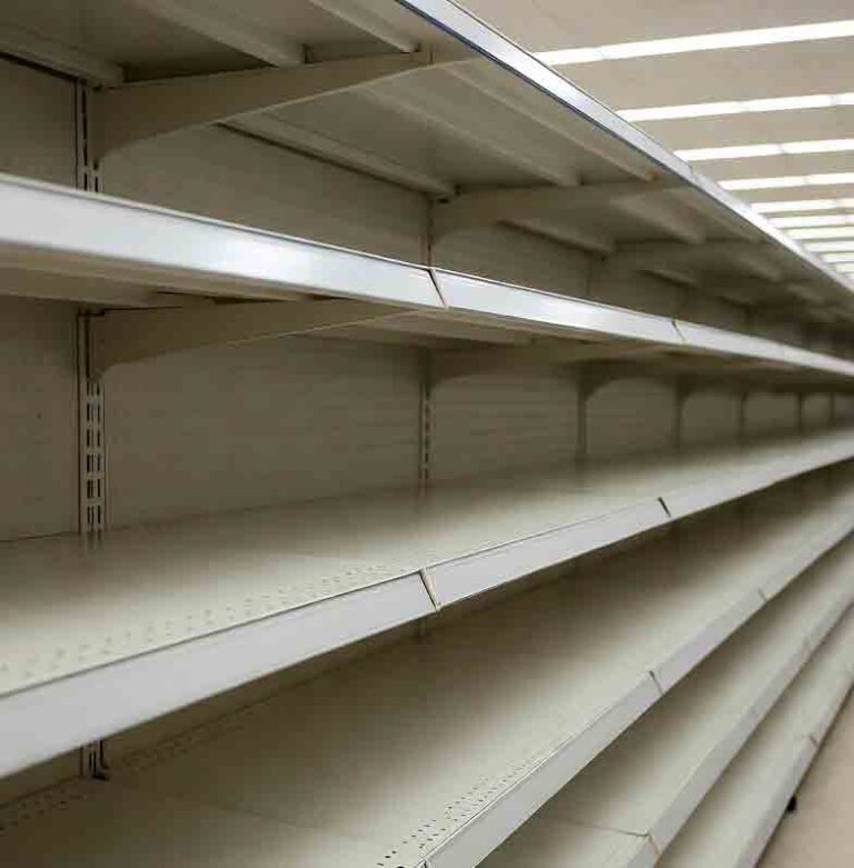 Empty shelves in gun store due to 2025 government shutdown firearm imports crisis