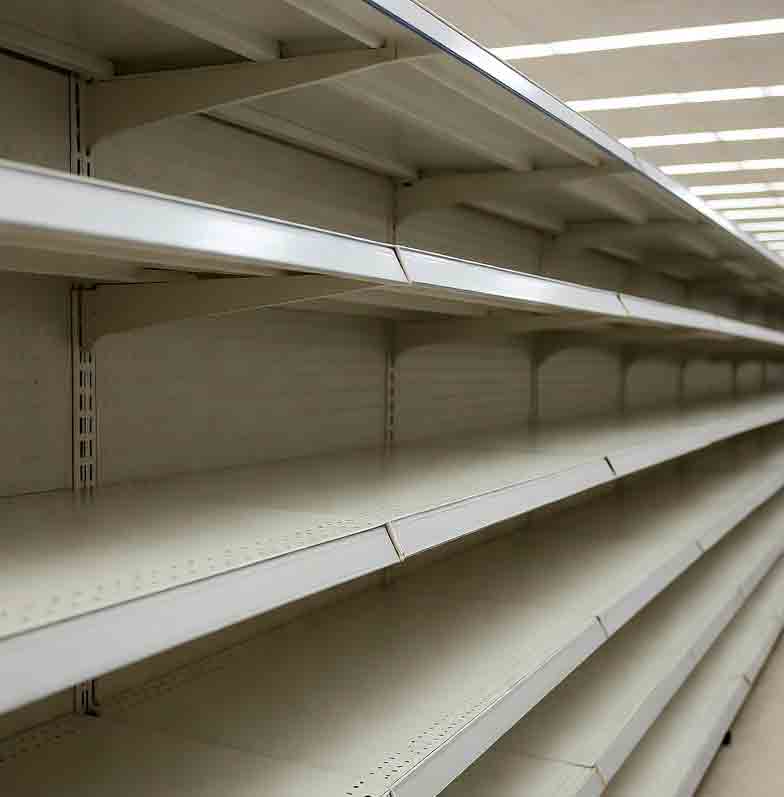 Empty shelves in gun store due to 2025 government shutdown firearm imports crisis