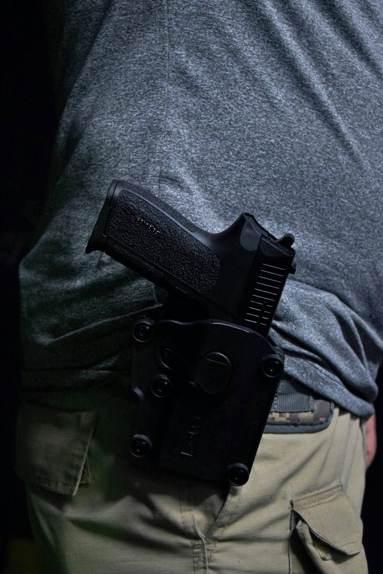 Pennsylvania constitutional carry SB 357 SB 822 — pistol in holster on person hip representing permitless concealed carry