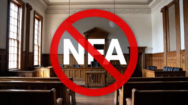 Inside court chambers getting rid of the nfa - Freedom’s Lodge Courtroom interior with a large red "no" symbol covering the letters "N/A", signaling not available or not allowed in this context.