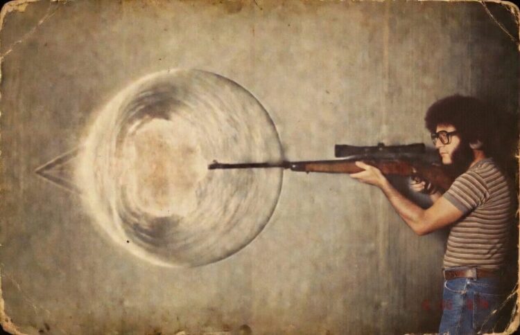 Man shooting rifle with muzzle blast - Freedom’s Lodge Man shooting rifle with muzzle blast
